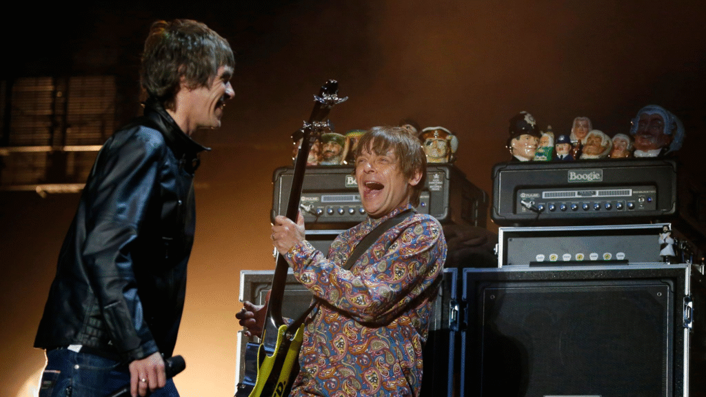 Mani (right) on stage with Ian Brown at one of the 2012 reunion concerts. Pic: Reuters