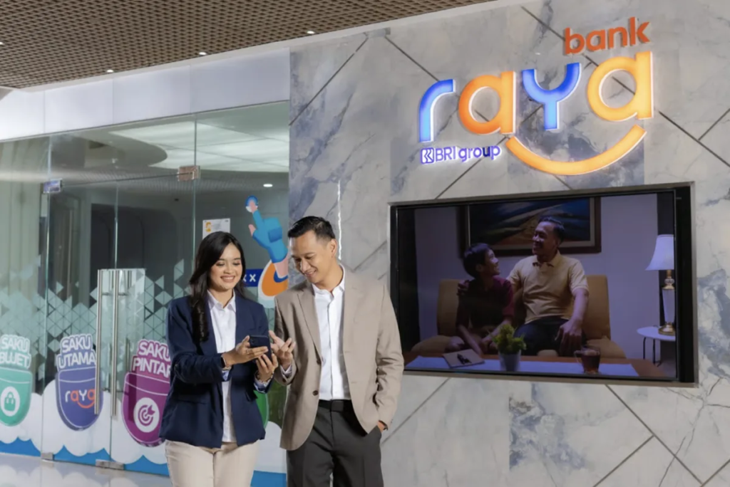 Genjot Inklusi Keuangan, Bank Raya Rilis Fitur QRIS Tampil untuk Belanja Makin Praktis