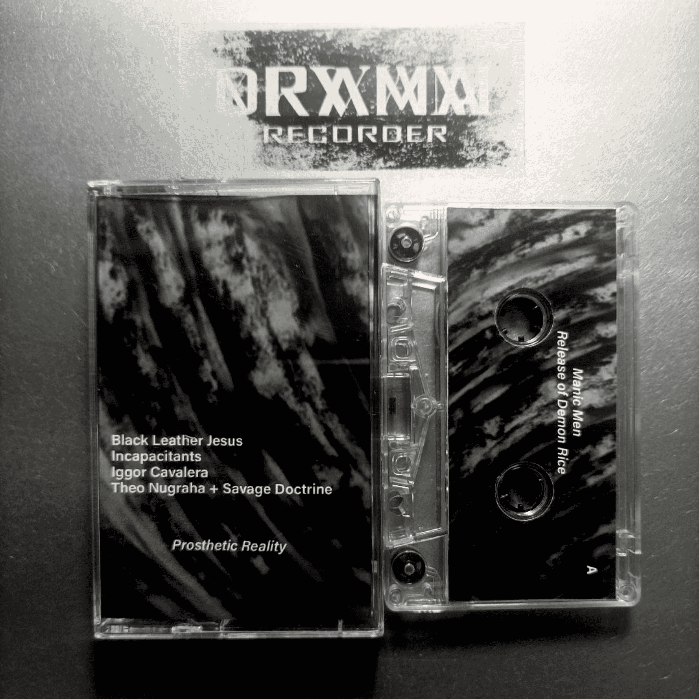 Prosthetic Reality – Limited Edition Cassette (Black Leather Jesus, Incapacitants, Iggor Cavalera, Theo Nugraha, Savage Doctrine)